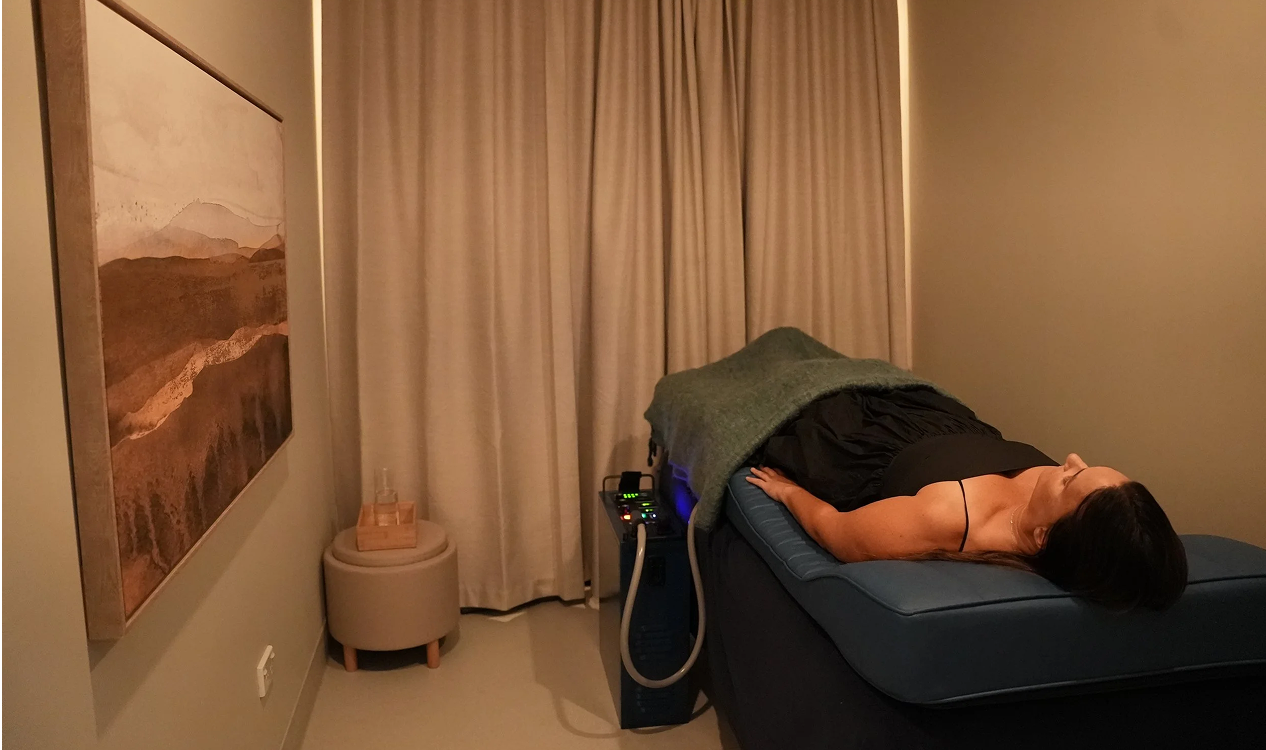 Person receiving PEMF therapy treatment